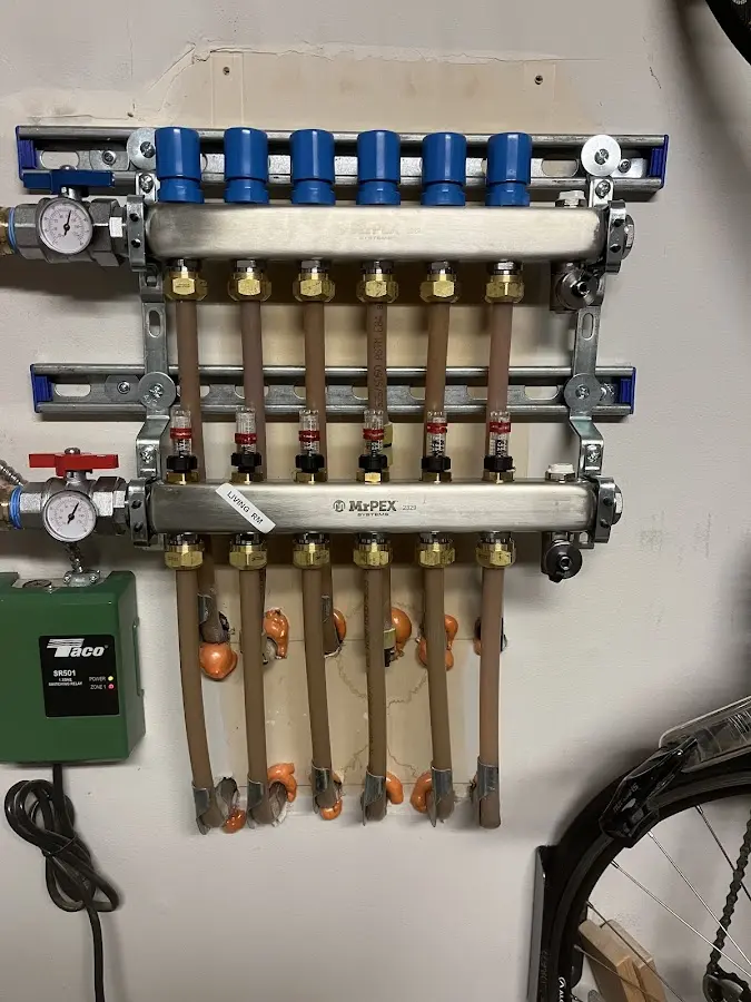 Plumber performing Water Heater Repair at a residential property in La Center